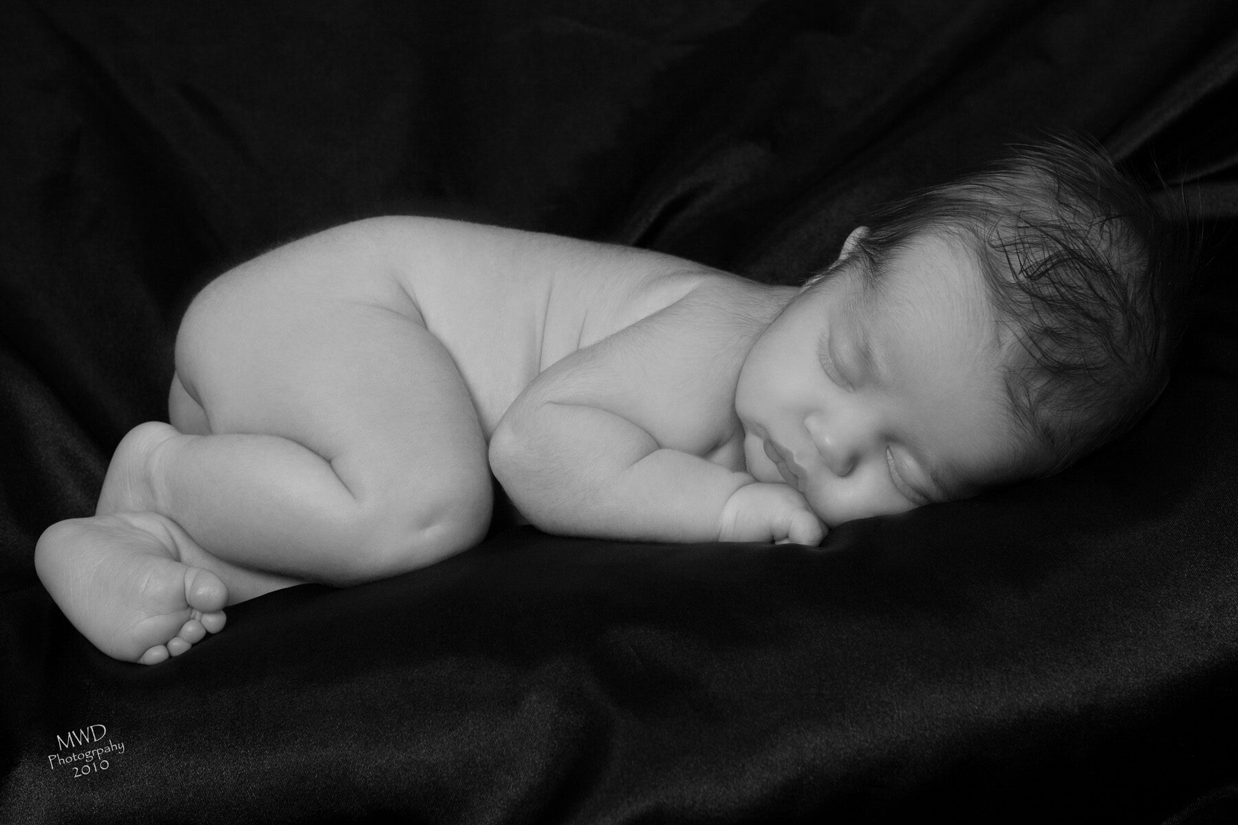 Sleeping newborn portrait by MWD Photography in Lombard, IL